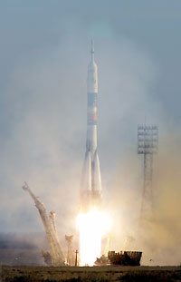 A Russian Soyuz TMA-7 spacecraft, with the ISS crew of U.S. space tourist Gregory Olsen, astronaut William McArthur of the U.S. and cosmonaut Valery Tokarev of Russia, blasts off from the launching pad at Baikonur cosmodrome in Kazakhstan October 1, 2005.