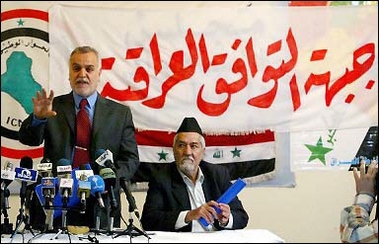 Tarek al-Hashimi (L), Secretary General of Sunni Muslim Iraqi Islamic Party, and Adnan al-Duliami, head of the General Conference for Sunnis in Iraq, announce in Baghdad the formation of a new alliance to run on one list in December 15 parliamentary election under the name Iraqi Concord Front.